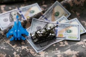 "Military personnel reviewing financial plans with 5starsstocks.com military investment tools."