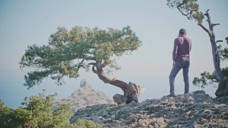 A couple sharing a spontaneous moment of connection in a scenic outdoor setting, symbolizing Atlas Eros.