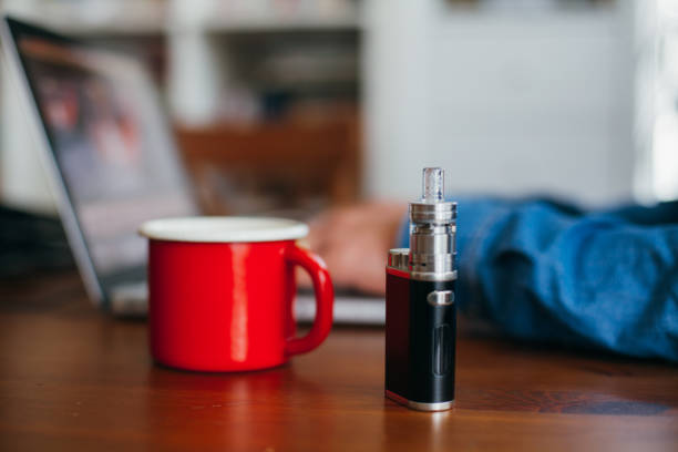 Smok JG1 CB111 vaping device on a modern surface.