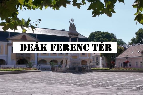 Bustling view of Deák Ferenc Tér in Budapest with surrounding buildings and people enjoying the square
